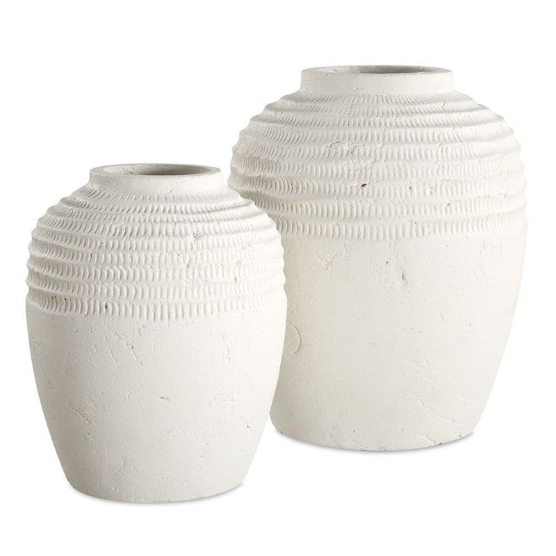 11 inch textured white vase with carved ribbed shoulder, shown with a larger size for scale