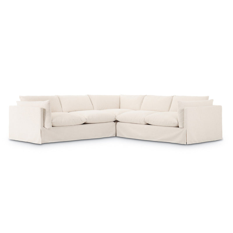 Habitat slipcovered sectional in Crypton Nomad Snow performance fabric with shelter arms.