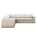 Tovana L-shaped sectional sofa in Crypton Nomad Snow performance fabric with pleated detailing.
