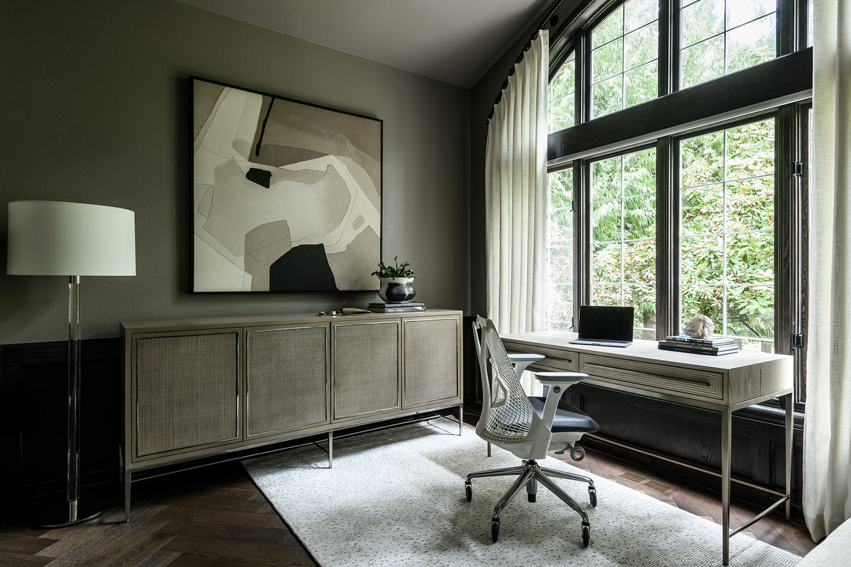 Office with credenza storage, designed by Elegant Simplicity Interiors for Mimi + Brooks.